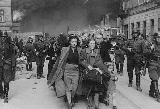 SS troops enter Warsaw Ghetto on the eve of Passover in order to liquidate it.